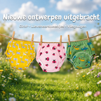 airenso trainingsbroekjes in geel, roze en groen aan een waslijn