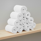 Opgerolde witte absorberende inleggers voor trainingsbroekjes